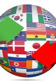 A sphere containing a mosaic of world flags. A red arrow and a green arrow are circling the sphere.