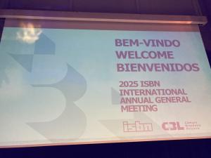 The projection showing a welcome message on the main auditorium screen