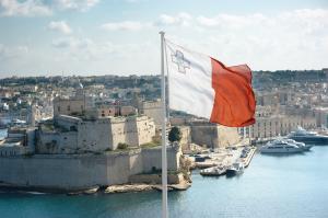 Maltese flag flying from upper Barrakka gardens in Valletta.