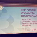 The projection showing a welcome message on the main auditorium screen