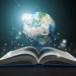 An image of the Planet Earth above an open book