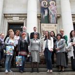 Photograph of meeting delegates in front of the National Library building